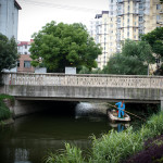 A guy cleaning the river.