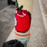 Defacement of public property by way of yarn is not a crime in Berlin. Here someone yarn-bombed a street pole and left a mysterious note that leaves us with no idea of what they wanted to accomplish: "Make people smile!"