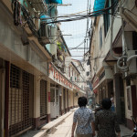 Two elders with short hair and cool patterns on their shirts stroll through an alley and revel in the glory of being grandmothers. I observe and wonder what it's like to have an offspring that has an offspring. I just could not relate to these women on any level.