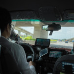 My first Taiwanese taxi driver and his many redundant GPS gadgets competing for his attention...