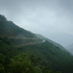 As we got higher the dropoffs from the switchbacks became steeper and it started raining more.
