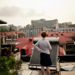 Danielle, one of my roommates, chilling on the roof after it rained.