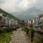 From the city below, facing the mountain.