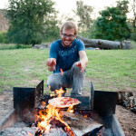 Me demonstrating how much I hate pizza by placing it directly above a fire in hopes of watching it burn slowly. I only smile that big when I'm torturing things.