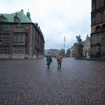 An elderly couple walk through a square in Bremen. They are on their way to the candy shop where you can buy chocolate bars in the shape of minature Euro bills. The shop also sells excellent gummy bears, if you're a connoisseur of that sort of thing.