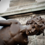 There were a lot of statues in Paris. I liked that. Here we have a statue boy looking for his statue father. He never found him and that is why this statue boy grew up to be an artist.