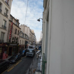 Upon further inspection...as advertised, our hotel room actually did had a marvelous view of the Eiffel Tower...as long as you were willing to hang half of your body out of the window in order to be amazed.