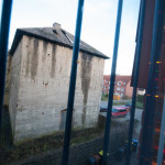 A view from our room on the third floor. Christmas lights taped to a window that had a splendid view of the bomb shelter.