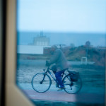 I can't wait to get old and ride my bike in the cold weather by a sea, experiencing dreary weather for months and months with no respite. ...But for now I'll just take pictures of random strangers from the windows of trams and buses.