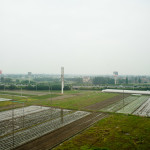 From Shanghai back to Hangzhou on the high-speed train. The little dots near the center of the picture are people working in the field.